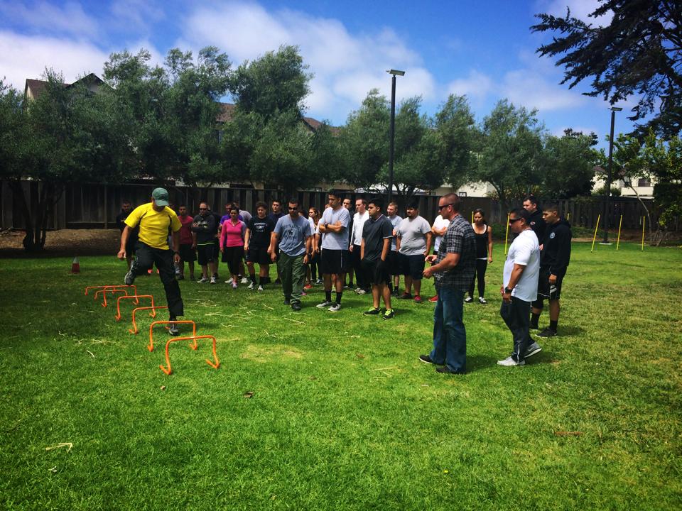 Group of participants outside engaging in activities